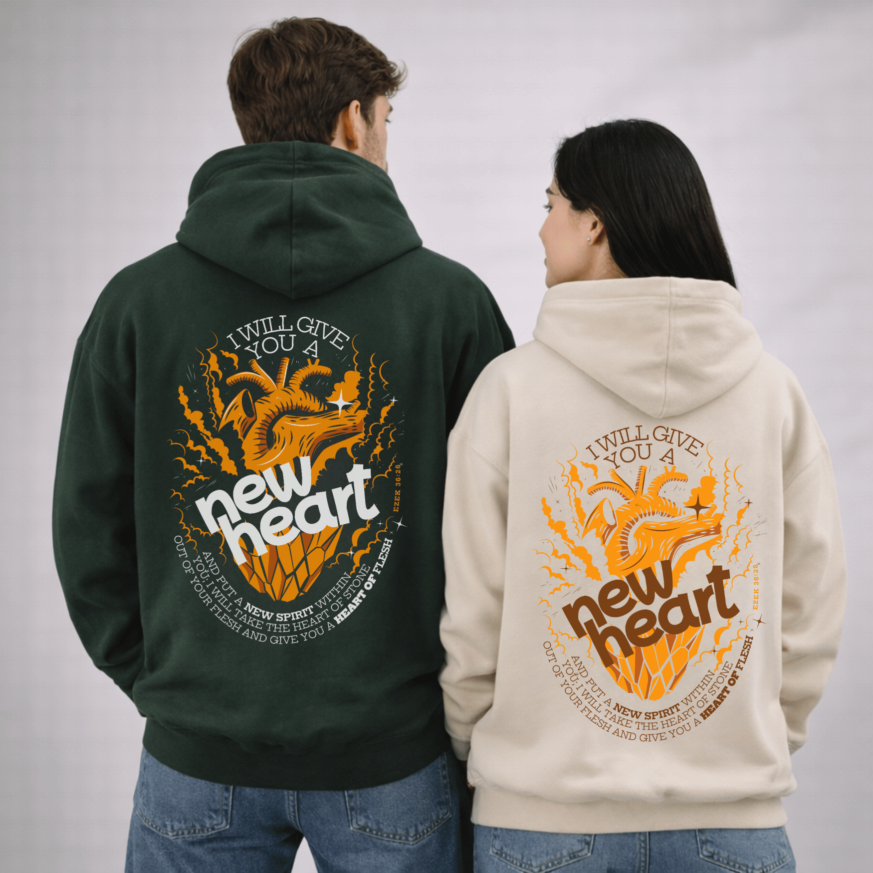 Two people wearing hoodies with a design and text on the back against a plain background
