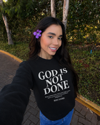 Sudadera Negra "Dios No Ha Terminado"