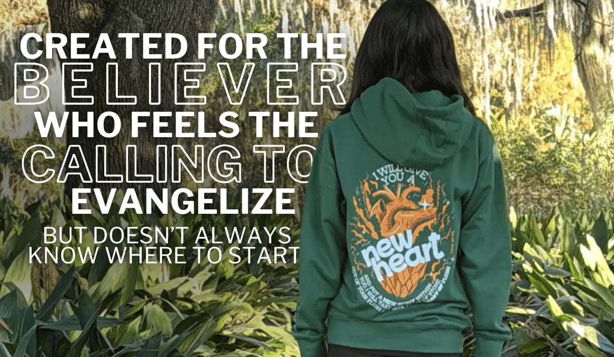 Person wearing a green hoodie with text on the back, standing in a natural setting.