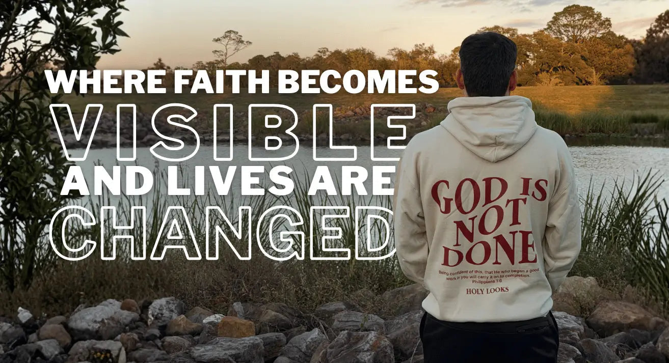 Person wearing a hoodie with 'God is not done' text, standing by a lake with text overlay.