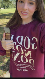 God Is Not Done Sweatshirt Maroon